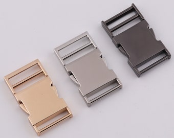May include: Three metal side release buckles in gold, silver, and black.