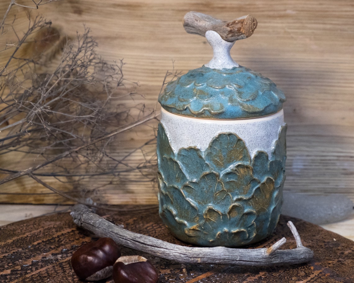 Handmade ceramic jar with driftwood handle lid. Can be used to Etsy