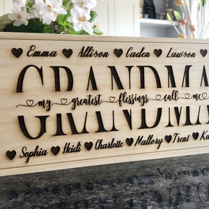 Personalized gifts for grandma with grandchildren names carved on a plaque