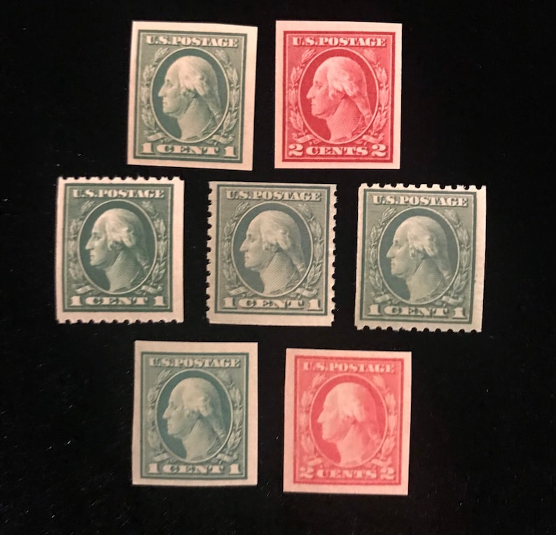 May include: A collection of six vintage US postage stamps featuring a profile of George Washington. The stamps are in green and red, with denominations of 1 cent and 2 cents.