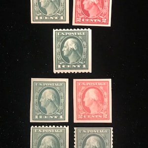 May include: Six vintage US postage stamps featuring a profile of George Washington.  The stamps are in two colors: green and red.  The stamps are all 1 cent except for two which are 2 cents.