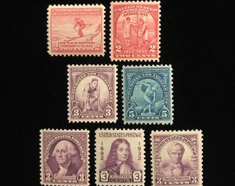 May include: A collection of six vintage United States postage stamps featuring various themes, including the 1932 Winter Olympics in Lake Placid, New York, Arbor Day, the 1932 Summer Olympics in Los Angeles, and portraits of George Washington, William Penn, and Daniel Webster.