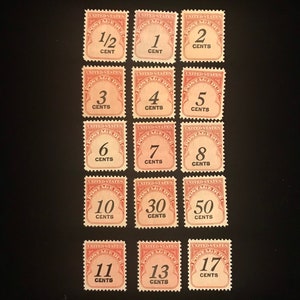 May include: A collection of vintage United States postage stamps with various denominations from 1/2 cent to 17 cents. The stamps are red and feature black text and numbers.