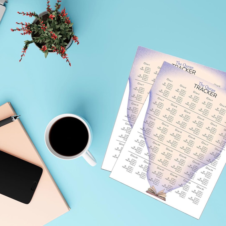 May include: A printable Quran tracker with a watercolor design of an open book with a purple and blue gradient. The tracker is divided into 30 sections, each representing a chapter of the Quran. Each section has a grid of 11 rows and 11 columns, with each cell representing a juz (part) of the Quran. The tracker is titled "The Quran Tracker".