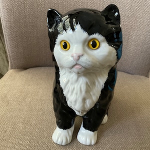 Black Cat with White Markings and Glass Eyes (8 ins h)