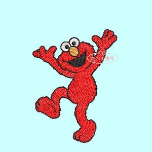 Op de afbeelding: Geborduurd rood personage met zwarte contouren, een brede glimlach en grote witte ogen. Het personage staat in een danshouding met opgeheven armen en één been opgetild. De achtergrond is lichtblauw.