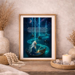 May include: A framed art print with a spiritual theme. The artwork depicts a woman in a boat, surrounded by glowing lines and boats, with a celestial background. The print includes text that reads, "We are threads of the same light..."