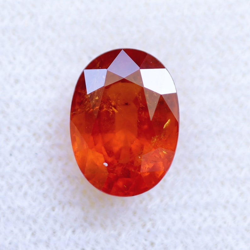 SP2103 Oval Natural Spessartite Garnet loose gemstones from Tanzania 3.6 cts. Orange Spessartite Garnet