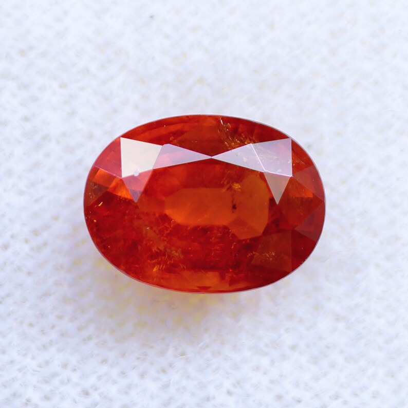 SP2103 Oval Natural Spessartite Garnet loose gemstones from Tanzania 3.6 cts. Orange Spessartite Garnet