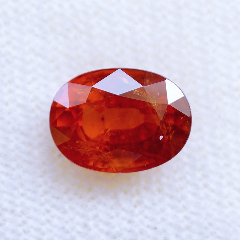 SP2103 Oval Natural Spessartite Garnet loose gemstones from Tanzania 3.6 cts. Orange Spessartite Garnet