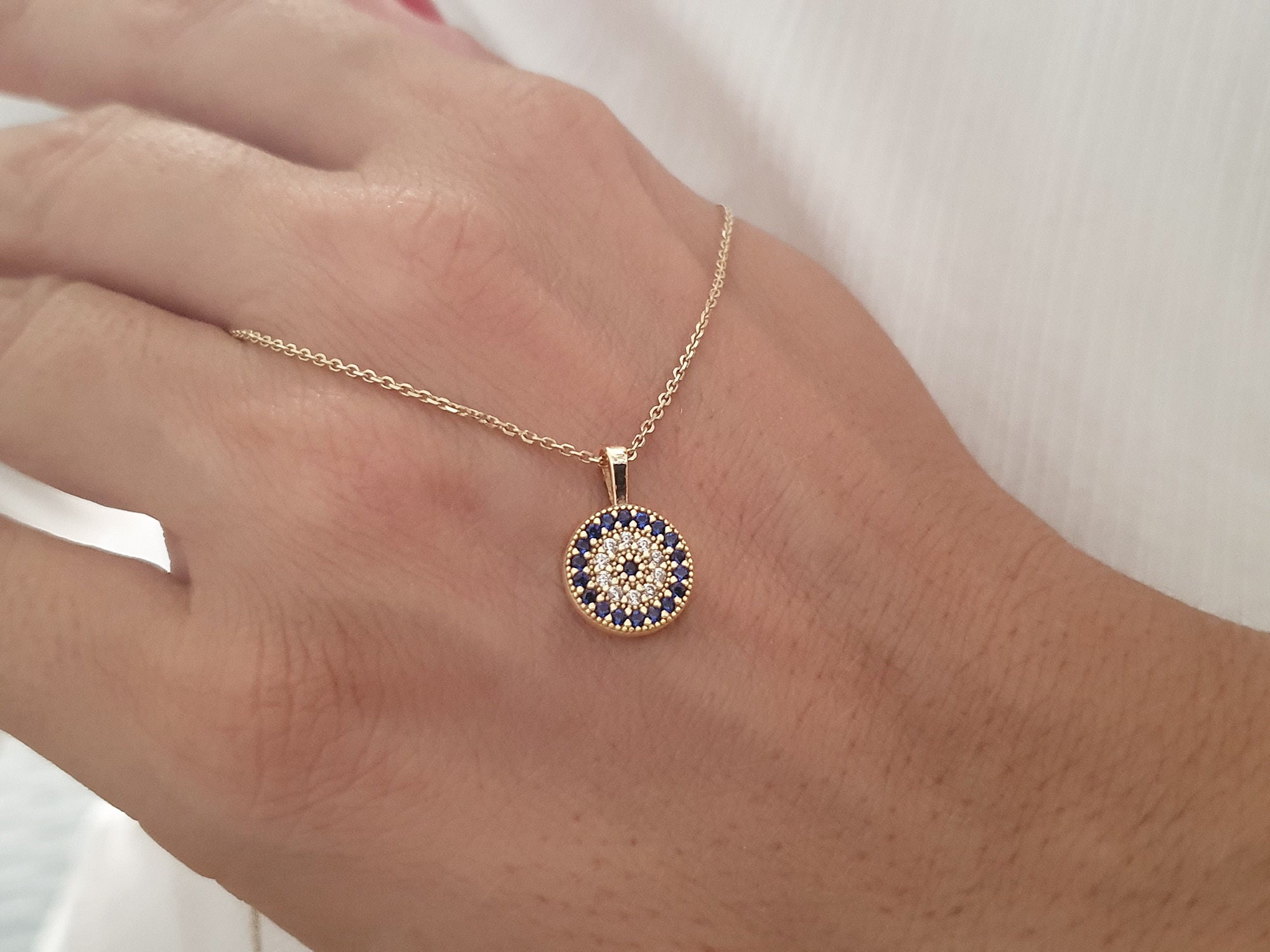 0.10 CT. T.W. Diamond Beaded Evil Eye Necklace in 10K White Gold | Peoples  Jewellers