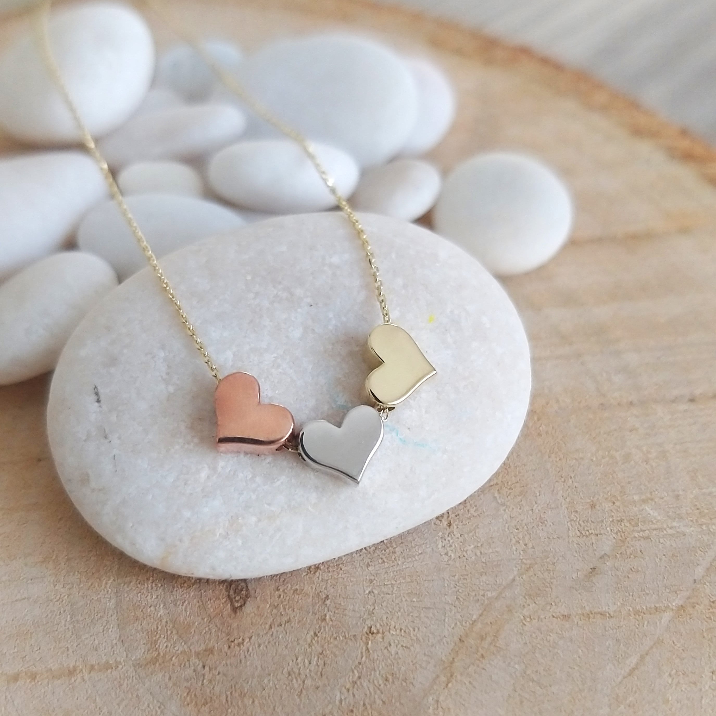 Three heart clearance gold necklace