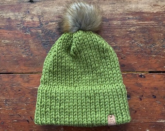 Green apple double brim knit hat made with 100% Peruvian Highland Wool and Faux Fur Pom-Pom.