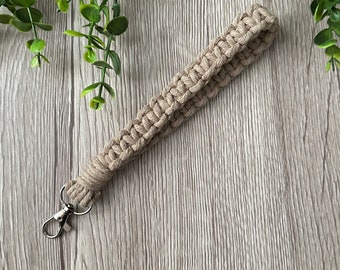 1 Sand Macrame Wristlet Keychain Handmade with recycled Cotton and a silver metal swivel clasp. Handmade in Ontario, Canada.