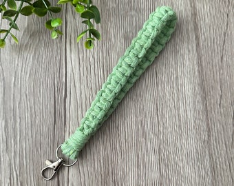 1 Pistachio Green Macrame Wristlet Keychain Handmade with Recycled Cotton and a silver metal swivel clasp. Handmade in Ontario.