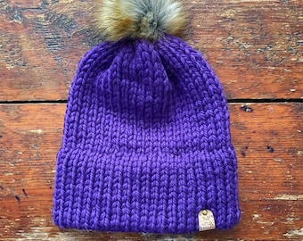 Purple double brim knit hat made with 100% Peruvian Highland Wool and Faux Fur Pom-Pom.