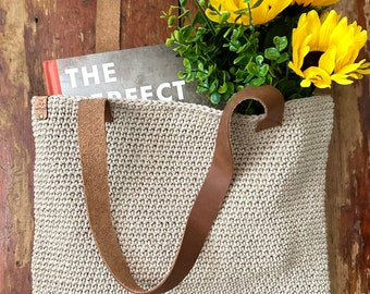 Handmade Jute coloured cotton knit/crochet tote bag with linen lining and leather straps. Approximately 14x14 inches +/-