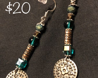 Long casual dangle earrings in silver, teal and bronze tones.