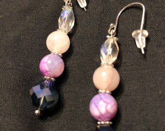 Purple dangle earrings with sterling silver ear wires.