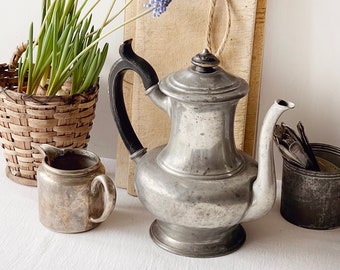 Dark and rustic antique pewter coffeepot with wooden handle and lid knob | Charming Victorian tin coffee or tea pitcher from late 1800's.