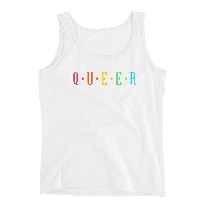 May include: White tank top with the word "QUEER" spelled out in rainbow colors.