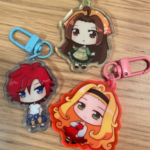 Story of Seasons A Wonderful Life Acrylic Charm and Sticker Sheet - 2 inch charms (Celia, Muffy, Nami)