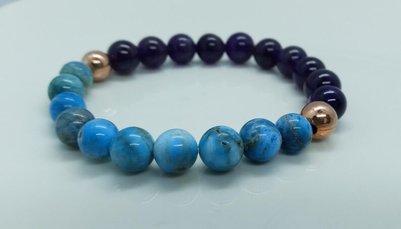 EvaDane Natural Garnet Gemstone Tibetan Bead Triskele Charm Stretch Bracelet EvaDane Natural Garnet Gemstone Tibetan Bead Triskele Charm Stretch Bracelet
