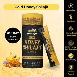 Puede incluir: Un recipiente cil&iacute;ndrico negro y dorado y un paquete de barritas de Honey Shilajit. El recipiente tiene el texto "Gold Honey Shilajit" y "Honey Shilajit Sticks". El paquete dice "Pure Strength in Every Drop". La imagen tambi&eacute;n incluye iconos sin gluten, sin OGM y halal.
