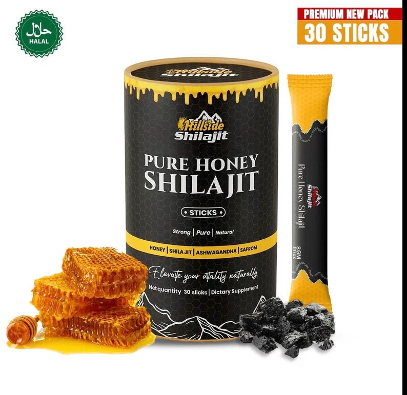 Op de afbeelding: Productafbeelding van een zwarte en gouden container met "Pure Honey Shilajit Sticks", een honingraat en een enkele stick. De container heeft een geel druipontwerp en de tekst "Elevate your vitality naturally". Het product is "Halal".