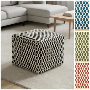 Pufe com padrão de cúpula: pufe listrado azul-petróleo e creme