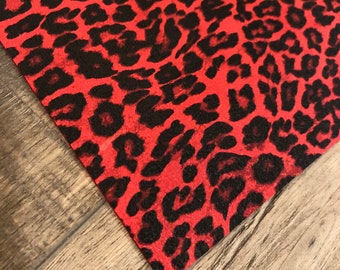 Lipstick Red Jaguar on Cowhide Leather Sheets