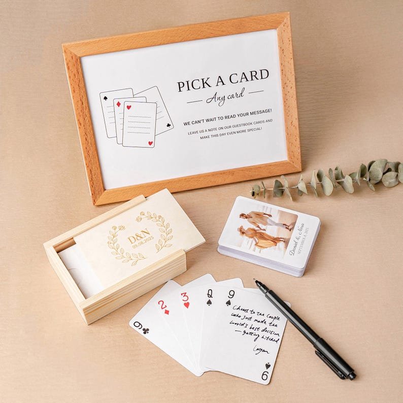 Wedding reception guest book with custom playing cards for a unique keepsake.