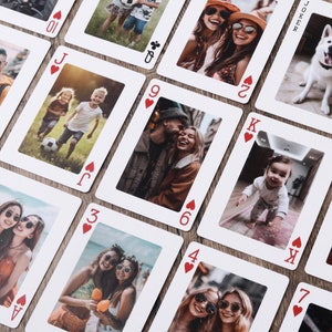 The front / face of the cards has the diagonal suits, while the center has four styles: lined, blank, with pictures, normal pattern.