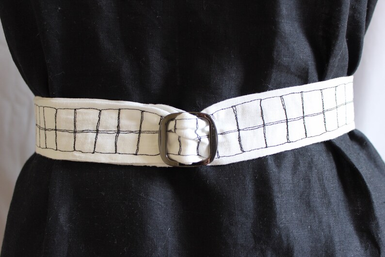 white fabric belt