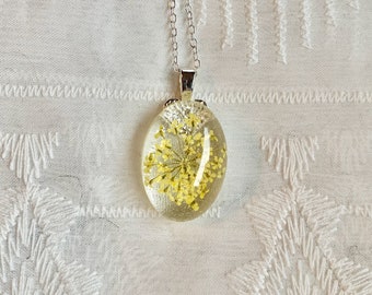 White Flower Oval Resin Pendant