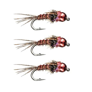 May include: Three brown and black fly fishing lures with copper wire bodies and red beads.