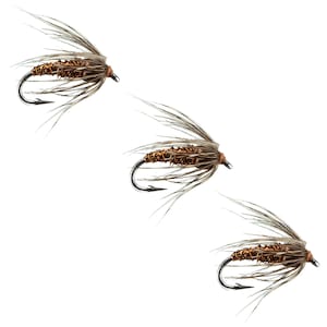 May include: Three brown and silver fishing flies with feathers and a copper wire body.