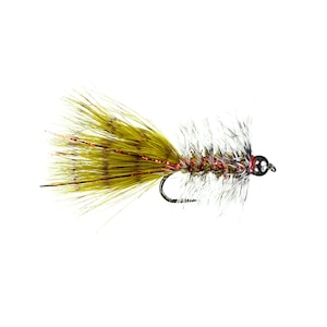 May include: A green and white fly fishing lure with a red and silver bead.