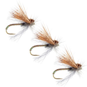 May include: Three brown and white fly fishing lures with gold hooks.