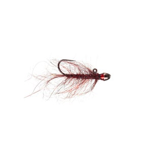 May include: A brown and red fly fishing lure with a hook and a bead.