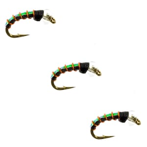 May include: Three green and black fly fishing lures with copper wire and clear beads.