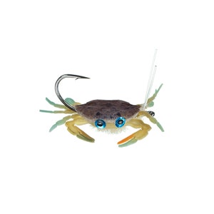May include: A realistic-looking, yellow and green crab lure with blue eyes and a silver hook. The lure is designed to resemble a real crab.