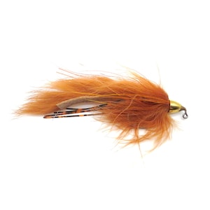 May include: A fly fishing lure with a gold-colored head and a hook. The lure features orange-brown feathers and a tan-colored strip, with black and orange accents. The lure is designed to attract fish.