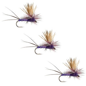 May include: Three purple and brown fly fishing lures with brown feathers and long tails.