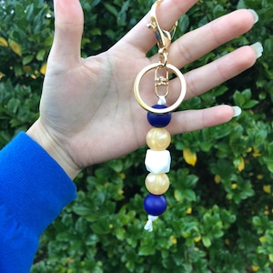 Sun eater inspired silicone keychain