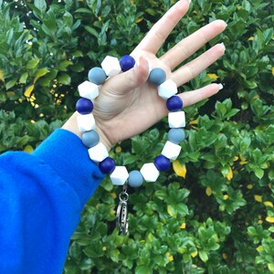 Sun eater inspired wristlet