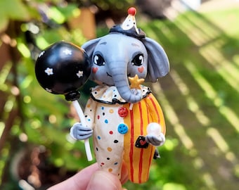 Elephant circus performer, clay figurine , animal miniature skulpture, elephant clown, magician, juggler, desk pet