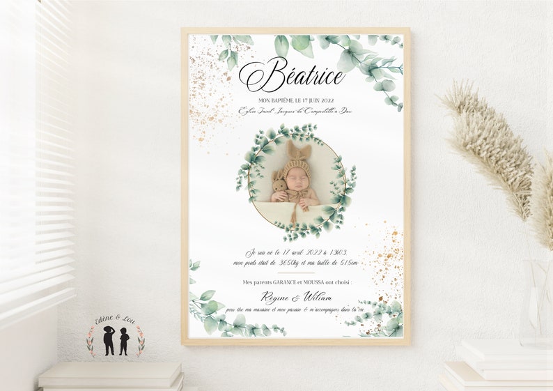 May include: A white framed print with a green watercolor floral design. The print features a photo of a baby in a white hat and a stuffed animal. The text on the print reads "Beatrice, Mon Bapt&ecirc;me le 17 Juin 2022, Eglise Saint Jacques de Capelle la Grande, Je suis n&eacute; le 17 avril 2022 &agrave; 13h03, mon poids &eacute;tait de 3,65 kg et ma taille de 51 cm, Mes parents GARANCE et MOUSSA ont choisi R&eacute;gine & William pour &ecirc;tre ma marraine et mon parrain et m'accompagner dans la vie."
