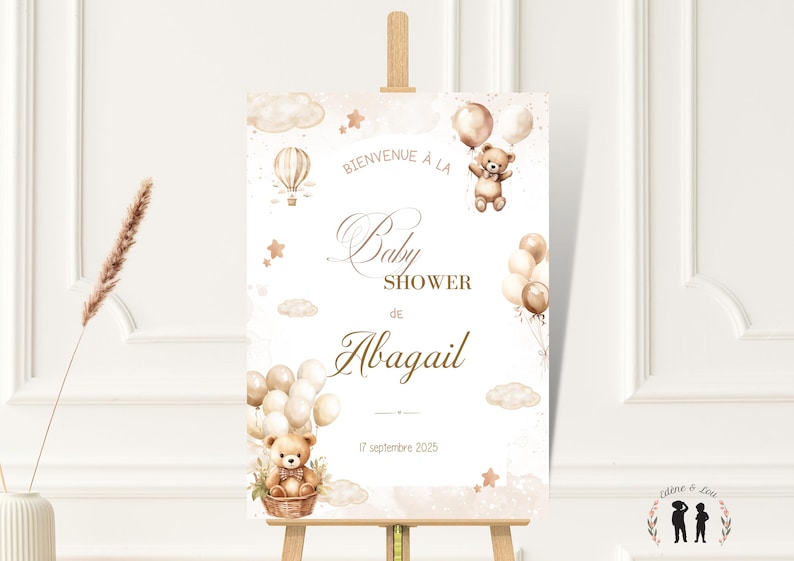 May include: A baby shower sign with a soft, neutral color palette. The sign features a teddy bear holding balloons, an air balloon, and the words "Baby Shower de Abigail" in elegant script. The date "17 septembre 2025" is also displayed.