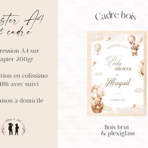 May include: A framed A4 poster with a baby shower theme. The poster features a teddy bear, balloons, and the words "Baby Shower" and a name. The frame is made of wood.